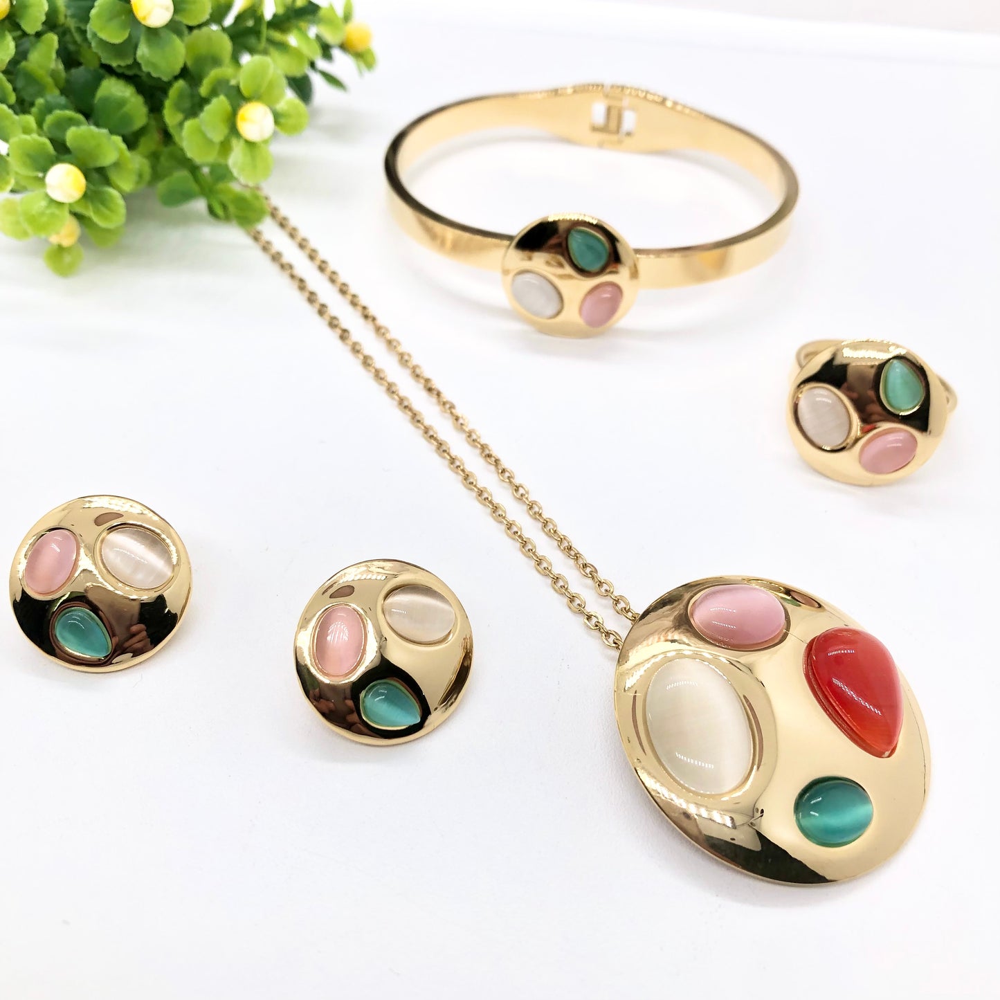 Gorgeous women's stainless steel necklace, earrings, bracelet, and ring set