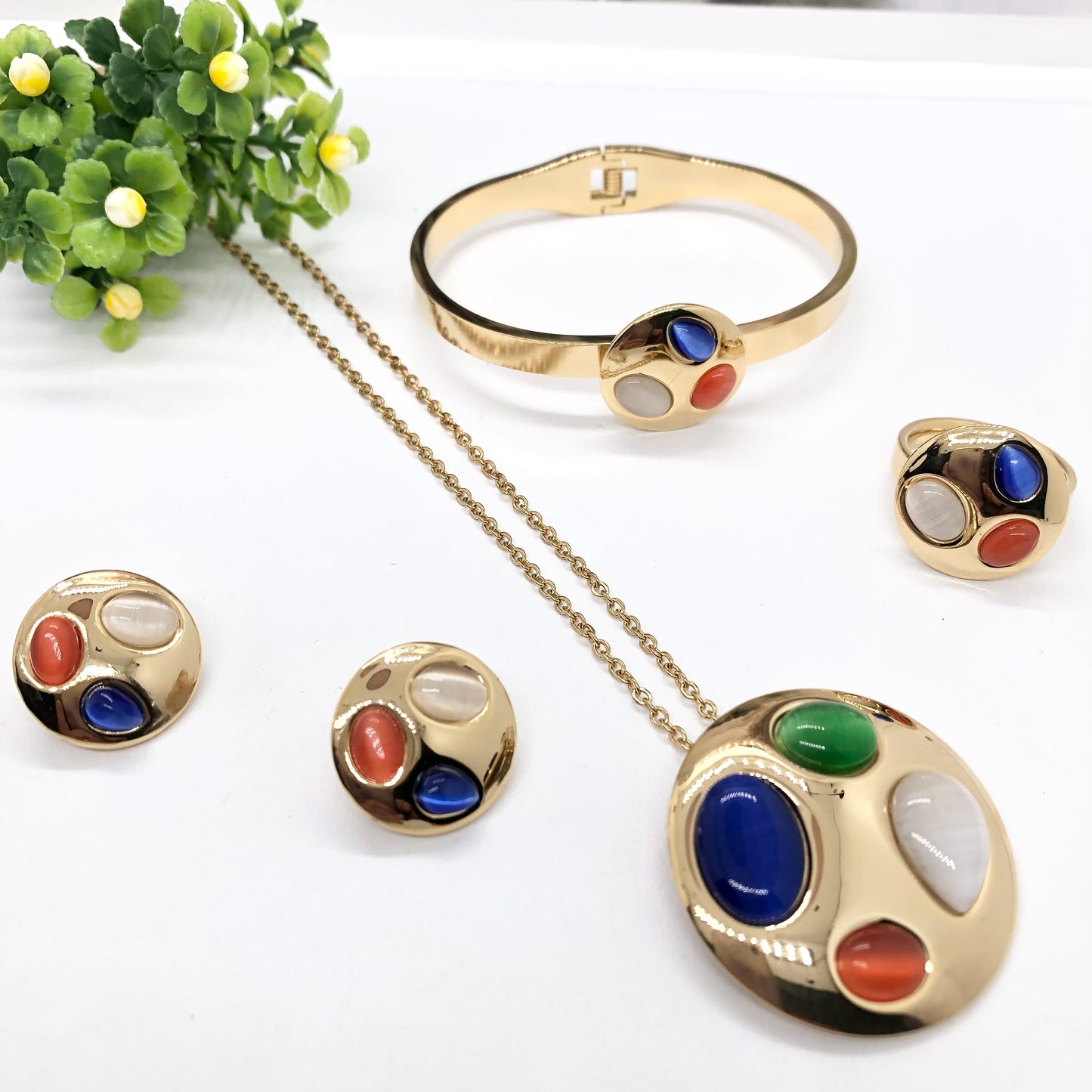 Gorgeous women's stainless steel necklace, earrings, bracelet, and ring set