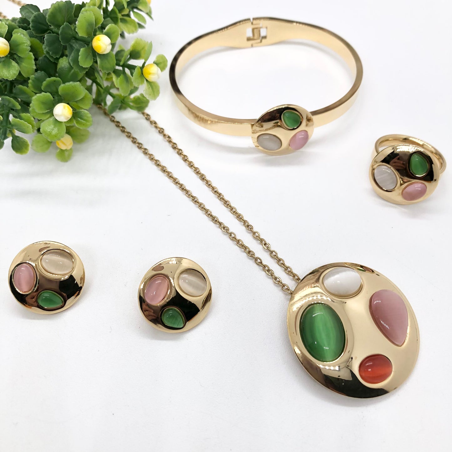Gorgeous women's stainless steel necklace, earrings, bracelet, and ring set