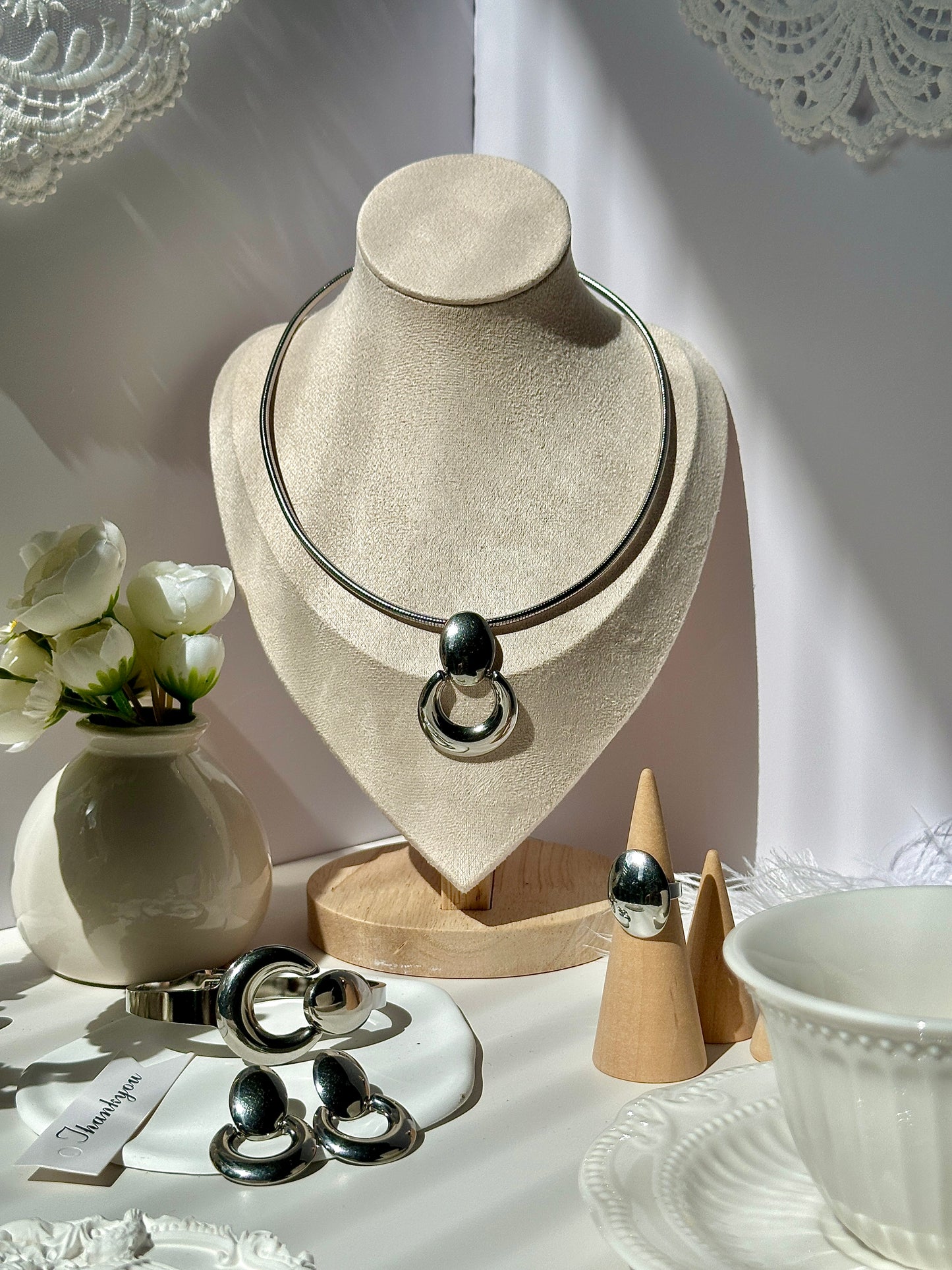 Gorgeous women's stainless steel necklace, earrings, bracelet, and ring set