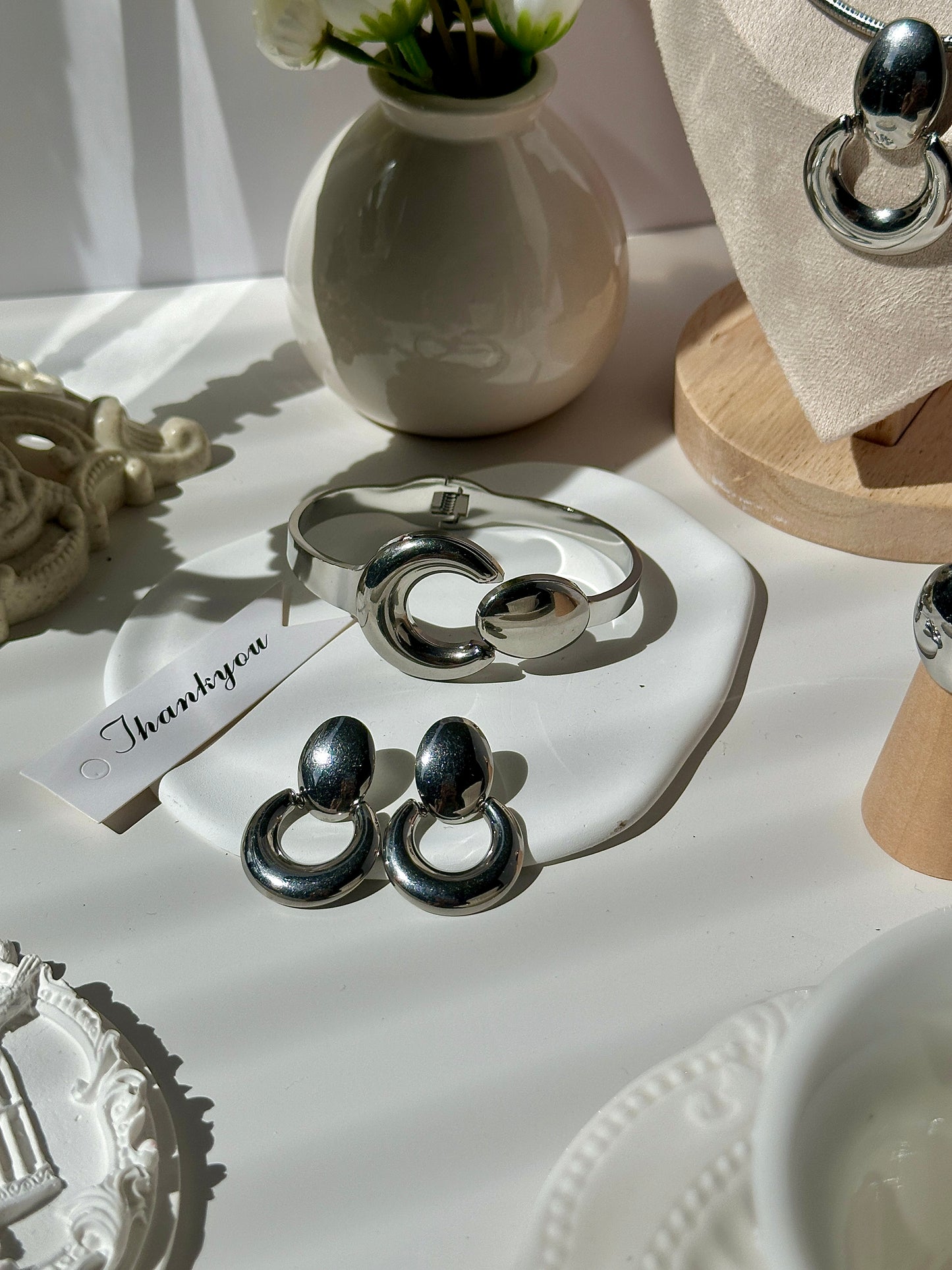 Gorgeous women's stainless steel necklace, earrings, bracelet, and ring set