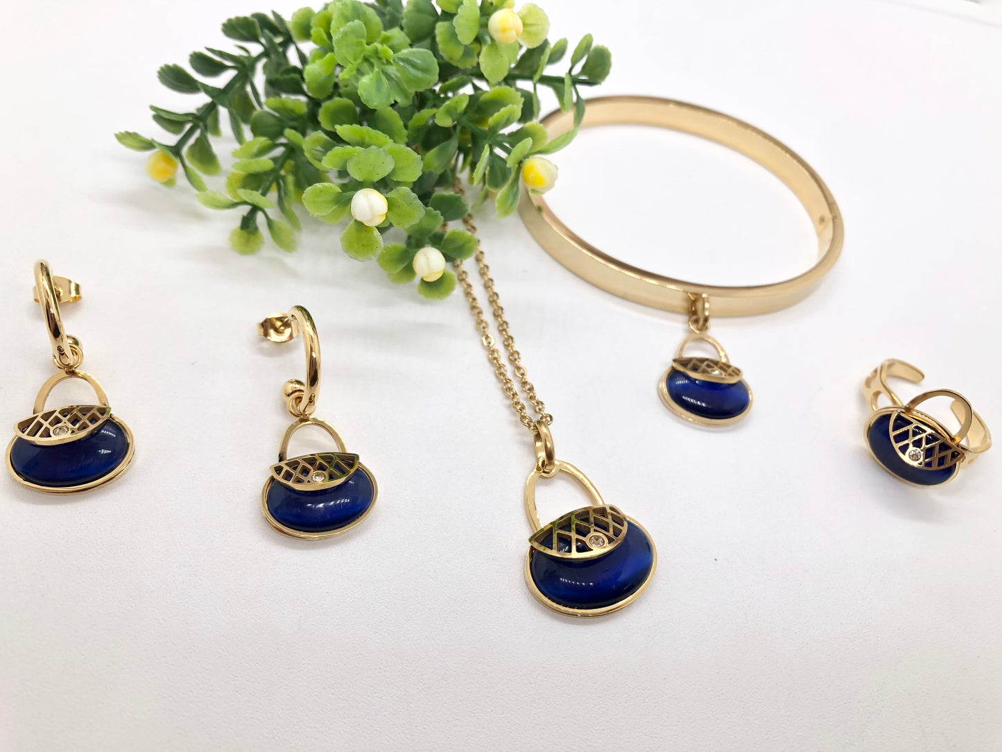 Gorgeous women's stainless steel necklace, earrings, bracelet, and ring set