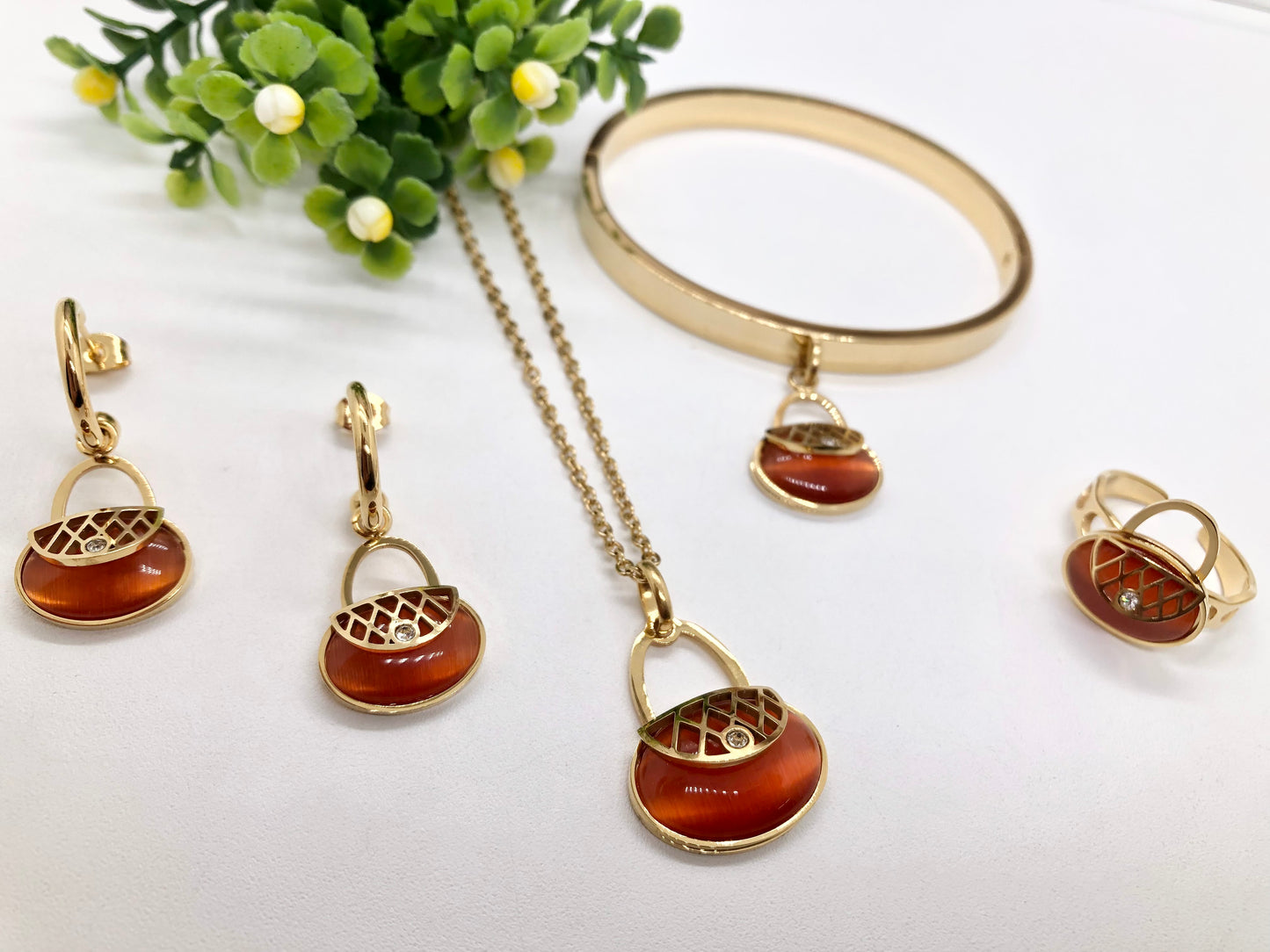 Gorgeous women's stainless steel necklace, earrings, bracelet, and ring set