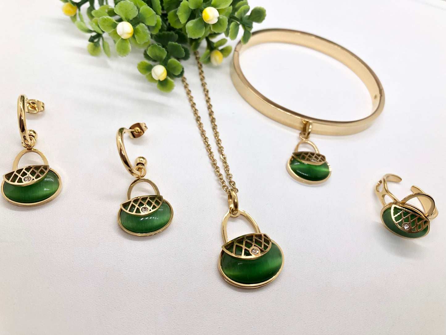 Gorgeous women's stainless steel necklace, earrings, bracelet, and ring set