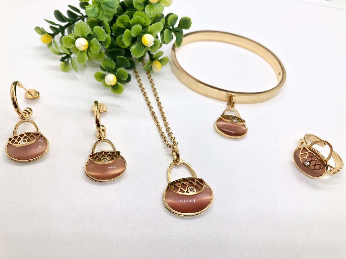 Gorgeous women's stainless steel necklace, earrings, bracelet, and ring set