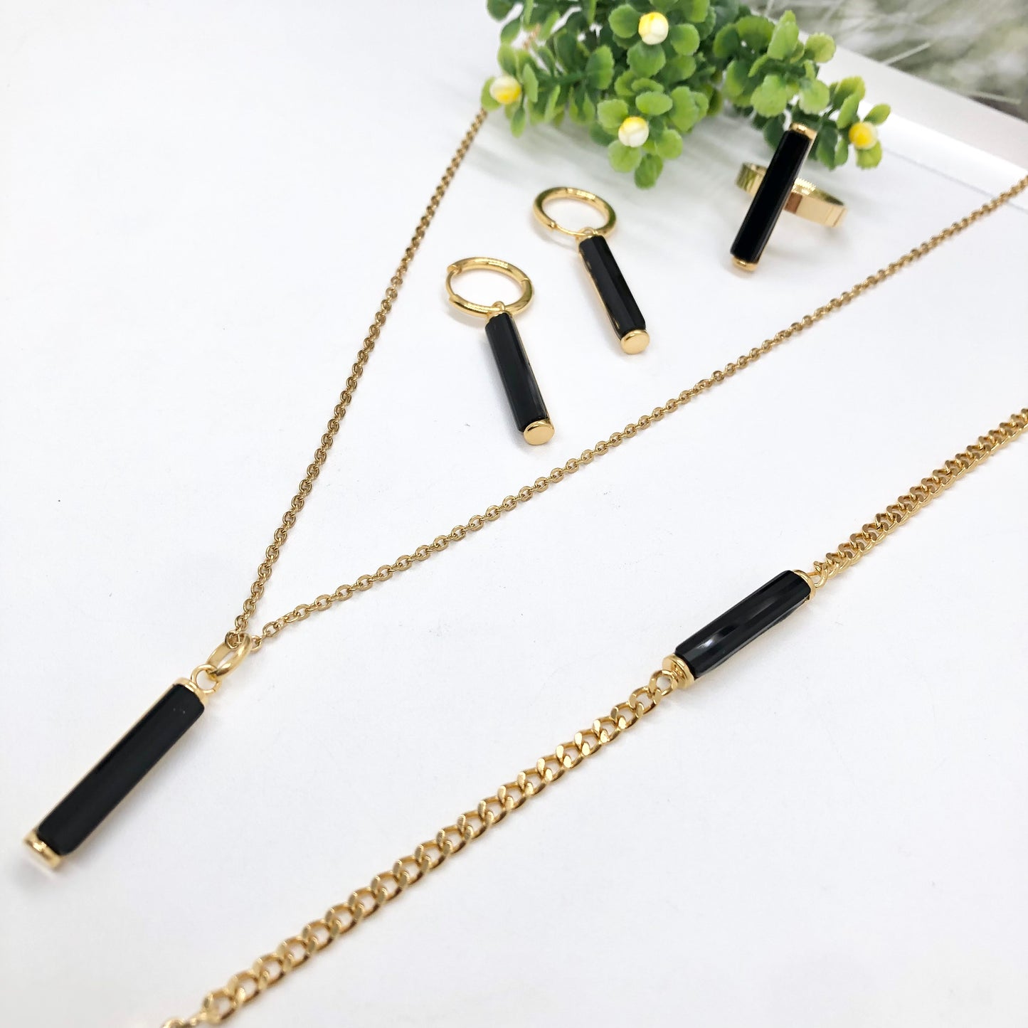 Gorgeous women's stainless steel necklace, earrings, bracelet, and ring set