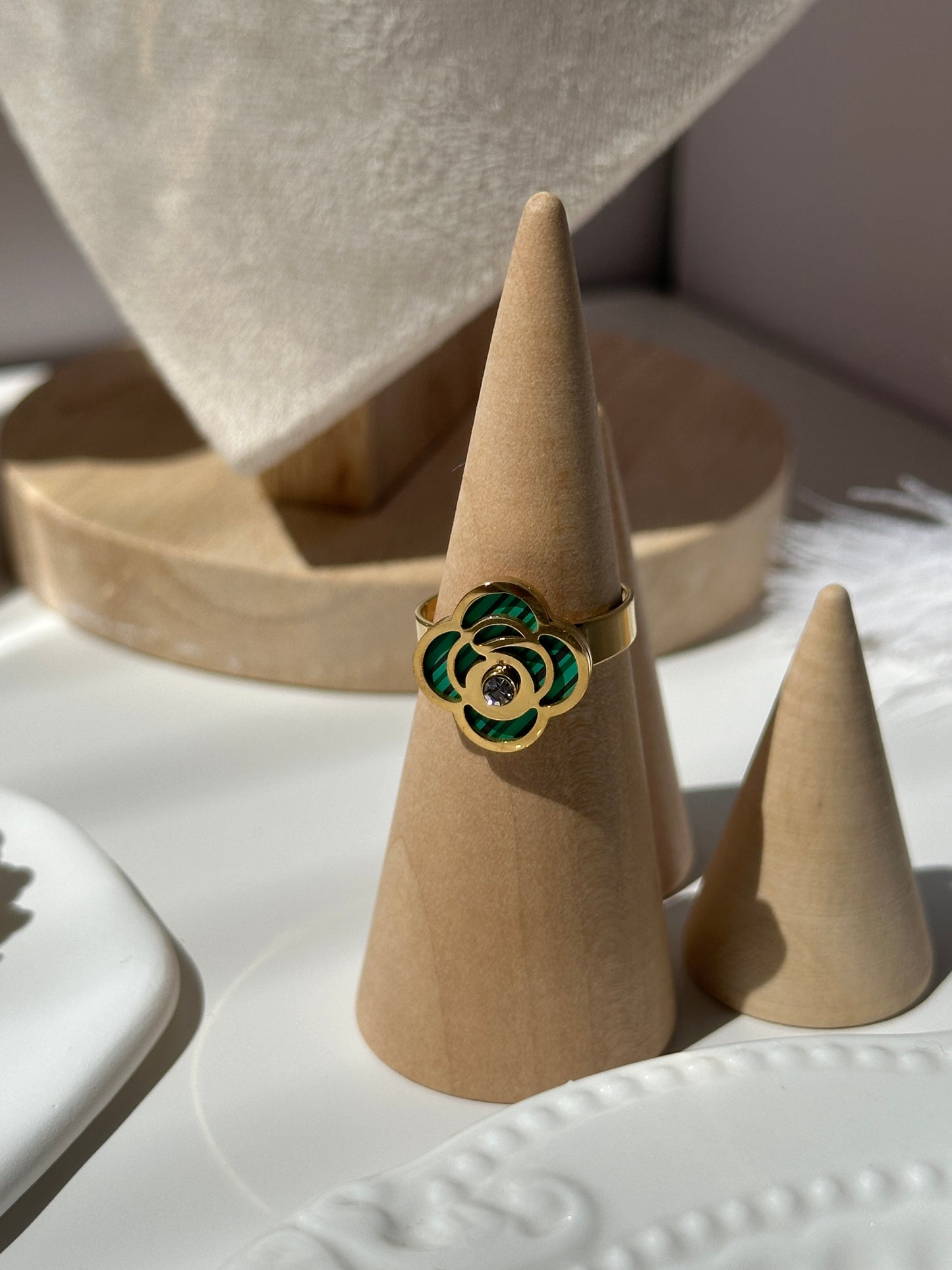 Explosive minimalist flower hollow pearl eye forest tie pure style necklace earrings ring titanium steel