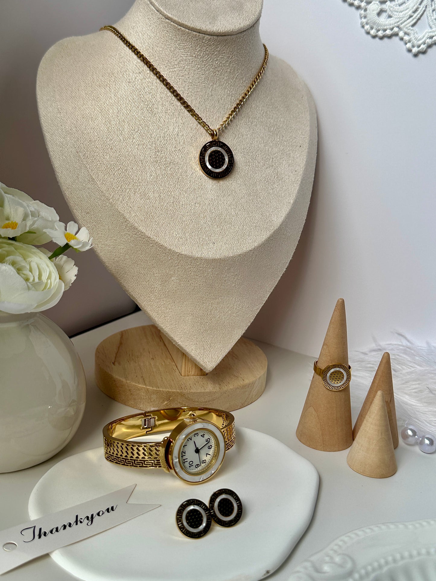 Explosive minimalist flower hollow pearl eye forest tie pure style necklace earrings ring titanium steel