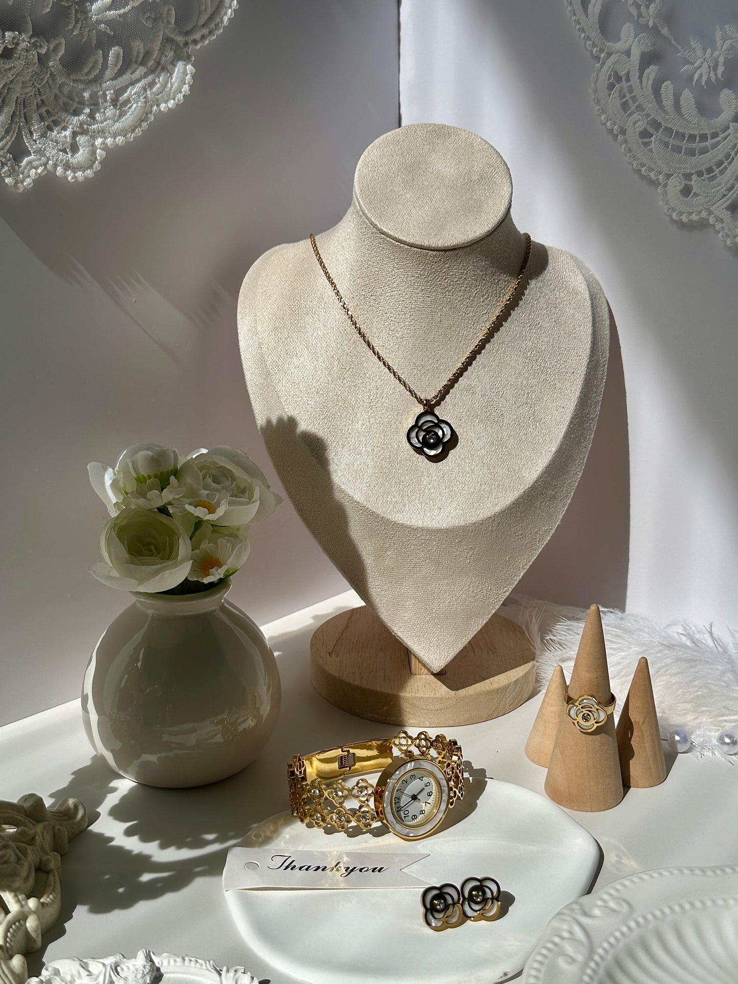 Explosive minimalist flower hollow pearl eye forest tie pure style necklace earrings ring titanium steel