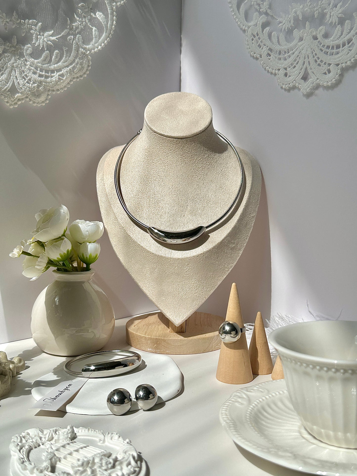 Explosive minimalist flower hollow pearl eye forest tie pure style necklace earrings ring titanium steel