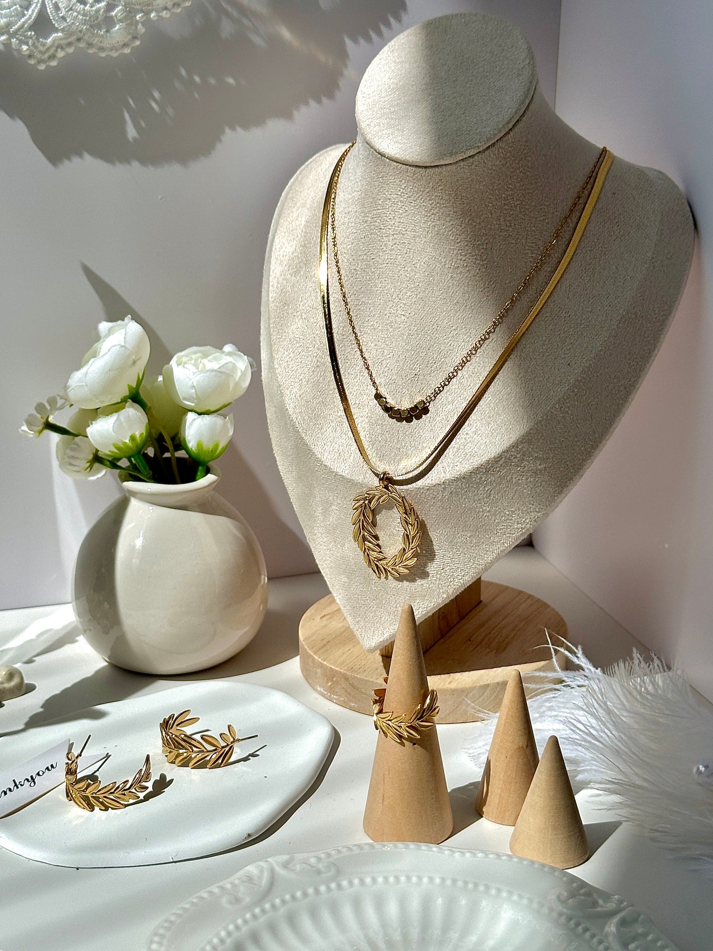 Gorgeous women's stainless steel necklace, earrings, bracelet, and ring set
