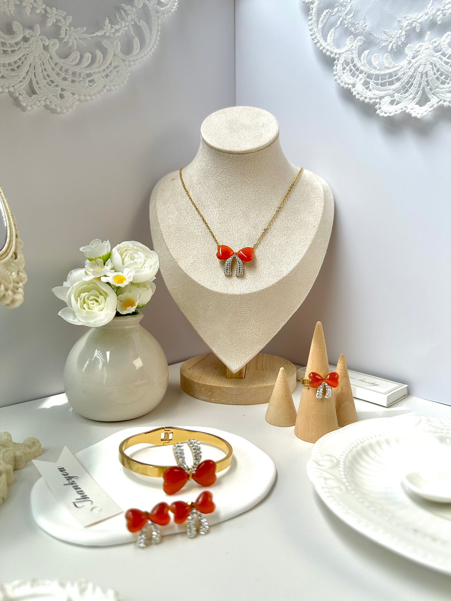 Explosive minimalist flower hollow pearl eye forest tie pure style necklace earrings ring titanium steel