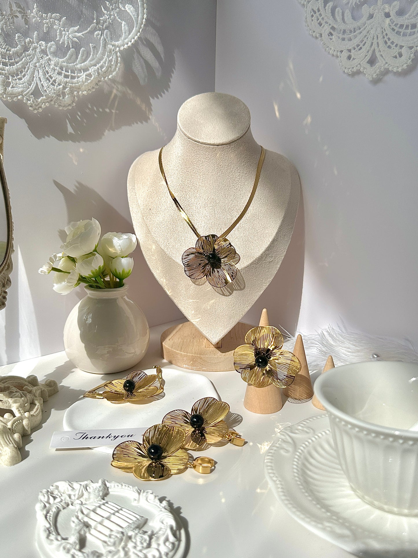 Explosive minimalist flower hollow pearl eye forest tie pure style necklace earrings ring titanium steel