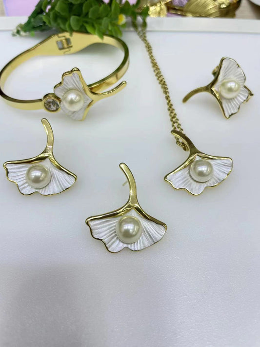 Gorgeous women's stainless steel necklace, earrings, bracelet, and ring set