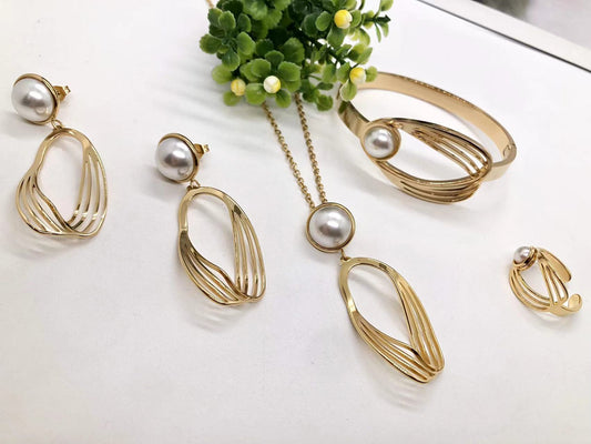 Gorgeous women's stainless steel necklace, earrings, bracelet, and ring set