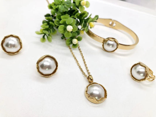 Gorgeous women's stainless steel necklace, earrings, bracelet, and ring set