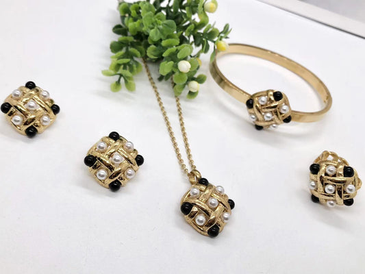 Gorgeous women's stainless steel necklace, earrings, bracelet, and ring set
