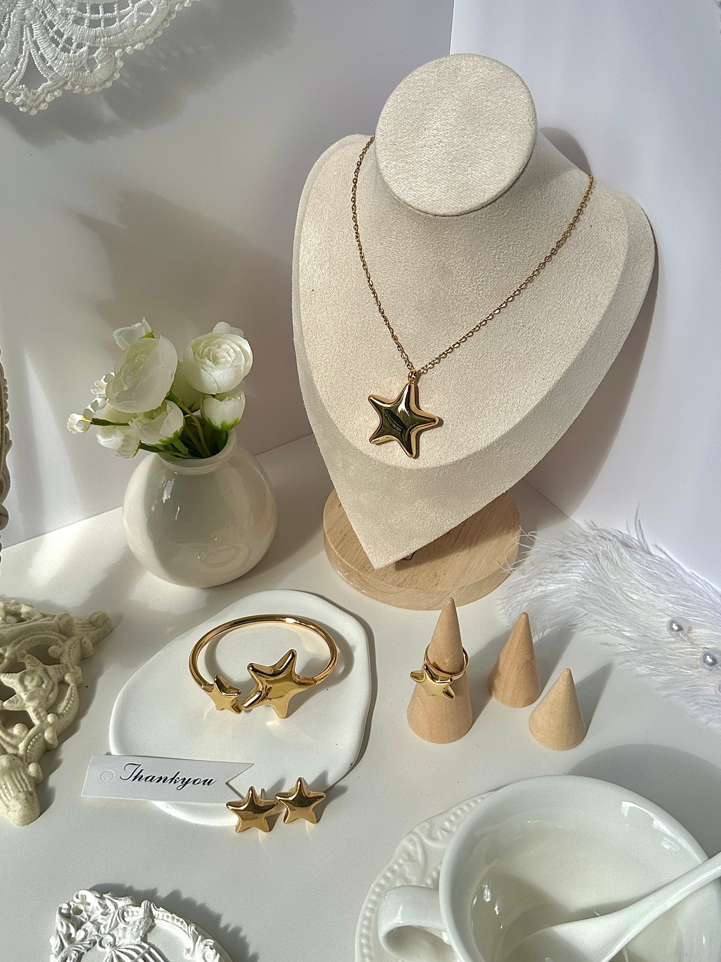 Gorgeous women's stainless steel necklace, earrings, bracelet, and ring set