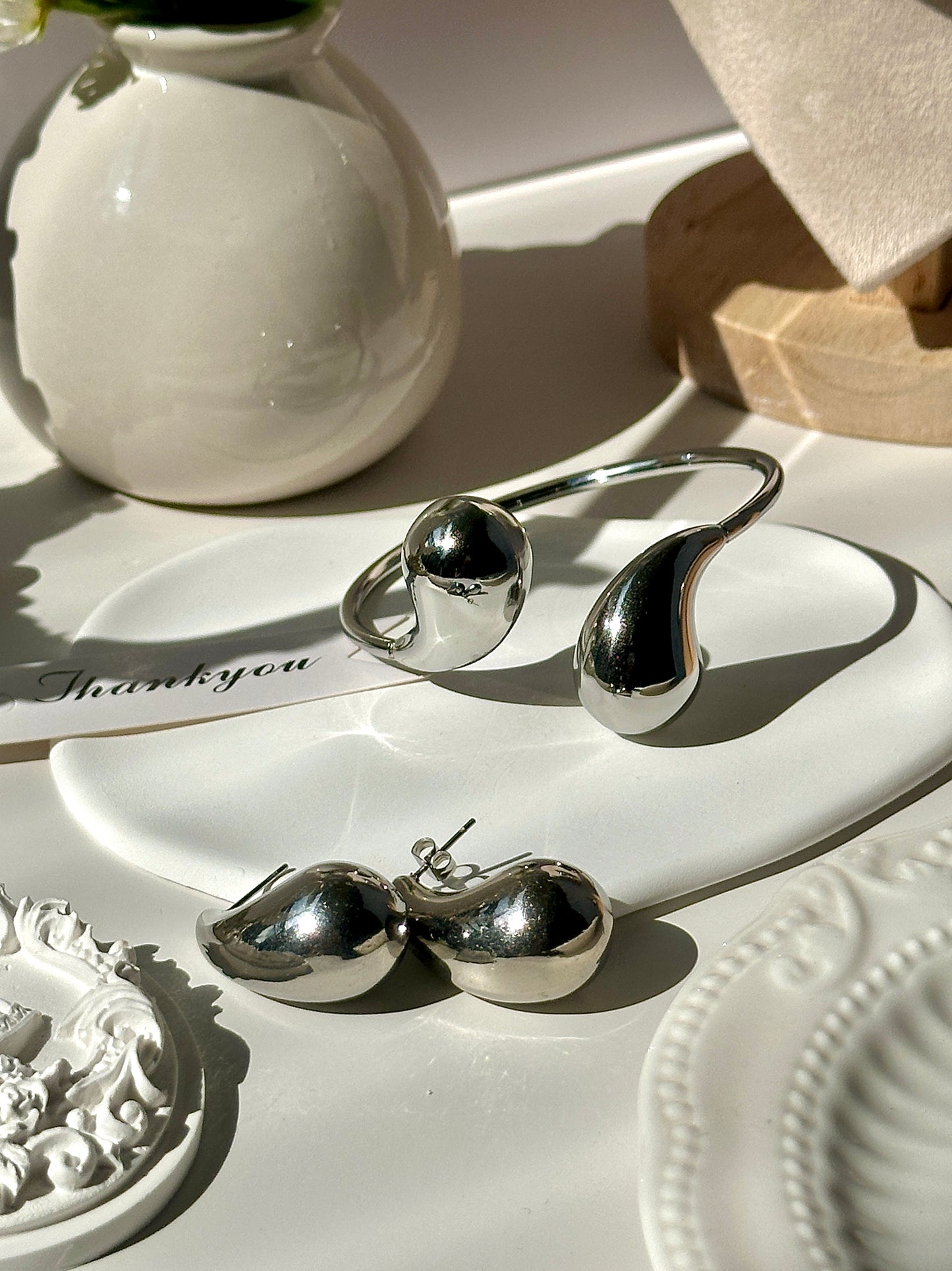 Gorgeous women's stainless steel necklace, earrings, bracelet, and ring set